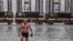 RESTRICTIONS -- CN photo gallery -- EMBARGOED until 31.1.2016 / Inglab, 64, a retired oil industry geophysicist is taking his daily swim in the Caspian sea in front of old oil rigs turned into a diving and maritime rescue center in Baku, Azerbaijan