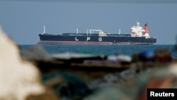 An LPG gas tanker sits at anchor as traffic is down in the Strait of Hormuz in Shinas, Oman, on March 11.