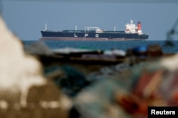 An LPG gas tanker at anchor as traffic is down in the Strait of Hormuz in Shinas, Oman, on March 11.