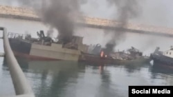 Konarak naval vessel still burning after being towed to port. May 11, 2020.