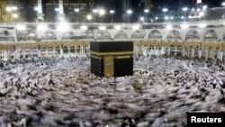 Saudi Arabia -- Muslims gather around the Kaaba inside the Grand Mosque during the holy fasting month of Ramadan in Mecca, June 8, 2016