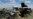 A soldier from Ukraine's 25th Separate Airborne Brigade prepares to launch a Hornet middle strike drone toward Russian troops from a position near a front line in the Donetsk region on June 23.