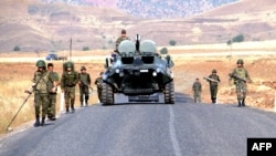 Turkish troops patrol in Sirnak Province, near the Iraqi border, on June 21.