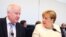 Angela Merkel și ministrul de interner Horst Seehofer la reîntîlnirea lor de marți la Berlin
