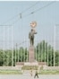 Tajikistan -- Then and now image showing central statues in Dushanbe