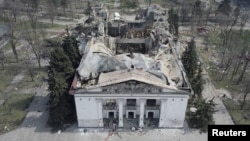 The building of the Mariupol theater after it was destroyed in a Russian missile attack