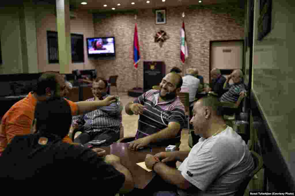 Men playing cards at the headquarters of Dashnak, the traditional Armenian political party, in the East Beirut neighborhood of Bourj Hammoud. Some 150,000 Armenians currently live in Lebanon, and are considered a powerful minority. &quot;I feel like I am part of a big dysfunctional family that will always be there if I need them,&quot; one Lebanese-Armenian says.&nbsp; &nbsp;