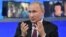 Russian President Vladimir Putin speaks during his annual nationwide televised phone-in show in Moscow on June 20.