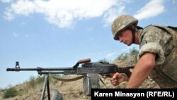 Nagorno-Karabakh -- A Karabakh Armenian soldier on frontline duty in the northern Martakert district, 20Jul2012.