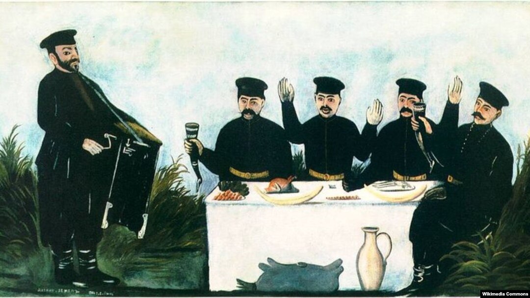 Pirosmani. Feast with Organ-Grinder Datiko Zemel