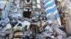 Russia -- Russian Emergency Situations Ministry employees clearing the debris at the site of an apartment building collapse