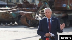 Lindsey Graham speaks to the media during his last visit to Kyiv on July 10.