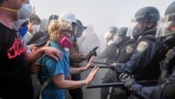 Лос-Анжелес шаарында мыйзамсыз мигранттарды жапырт кармоого каршы тутанган нааразылык акциялар