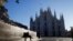 Romania- People walk through a near-empty Duomo square, usually full of people, coronavirus