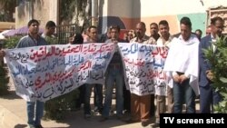 Iraqi journalists hold a protest over the killing killing of RFI journalist Mohammed Bdaiwi Owaid al-Shammari on March 23.