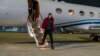 U.S. basketball star Brittney Griner arrives at Kelly Field in San Antonio following her release in a prisoner swap with Russia on December 9.