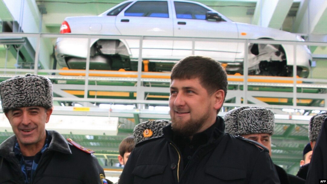Ramzan Kadyrov (center) attends the opening ceremony for the Lada Priora assembly line in Chechnya in January 2012.