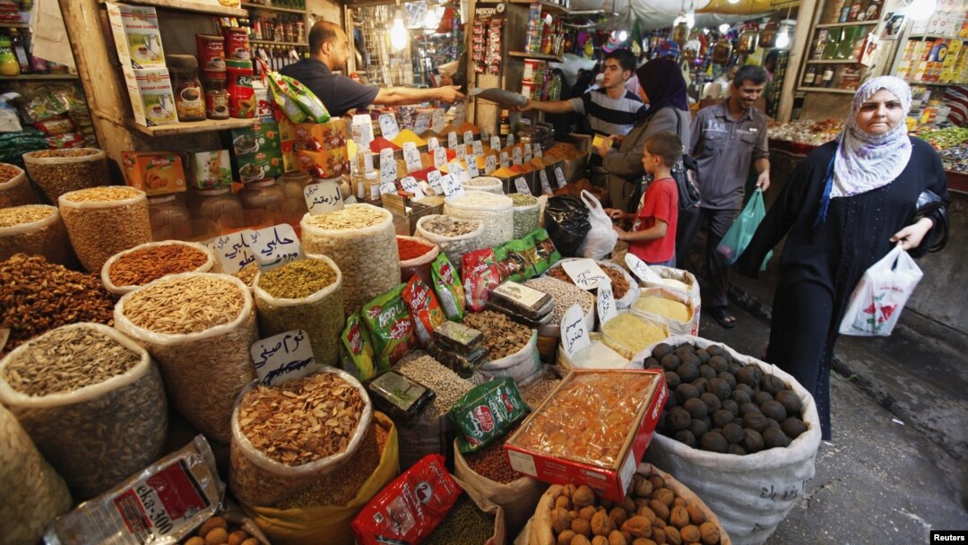 Iraqis shop at a market in Baghdad in preparation for Ramadan.