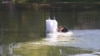 Moldova, A worker installs a dam on the water near the water pumping station on the Dniester River in Vadul lui Vodă, August 3, 2026