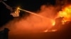 Рятувальники гасять пожежу внаслідок атаки на Одесу, 2 травня 2024 року