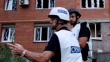 Observatori OSCE într-un cartier de locuinţe la Doneţk, 9 septembrie 2014