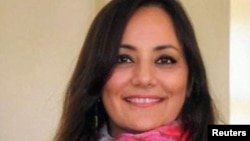 Reuters released an undated photo it said it was able to confirm was of Dena Karari, an Iranian-American allowed to leave Iran.