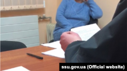Фрагмент кадра из видео предъявления подозрения в сепаратизме.