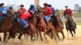 Kazakhstan (blue) prevailed as usual in kokpar, its version of goat-grabbing, by a score of 5-4 over Kyrgyzstan in the final at the World Nomad Games. 