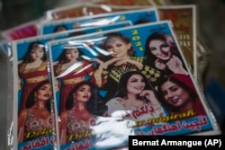 DVDs of Afghan singers on display in a shop in Kabul in September 2021