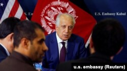 U.S. special envoy for peace in Afghanistan Zalmay Khalilzad talks with local reporters at the U.S. Embassy in Kabul in November.