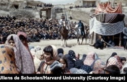 A picture of an apparent theatrical event described as the “impersonation of ‘Shemr’.” The photo was made in Nahavand in western Iran.