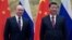 Russian President Vladimir Putin meets with Chinese President Xi Jinping in Beijing on February 4. The Ukraine crisis is a test for Beijing and Moscow’s warming ties -- one that analysts believe China and Russia will pass.
