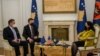 U.S. special envoy Gabriel Escobar (left) and EU envoy Miroslav Lajcak meet with the president of Kosovo, Vjosa Osmani, in Pristina on January 31.