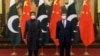 Pakistani Prime Minister Imran Khan and Chinese President Xi Jinping pose for a photo before a bilateral meeting in Beijing on February 6. 