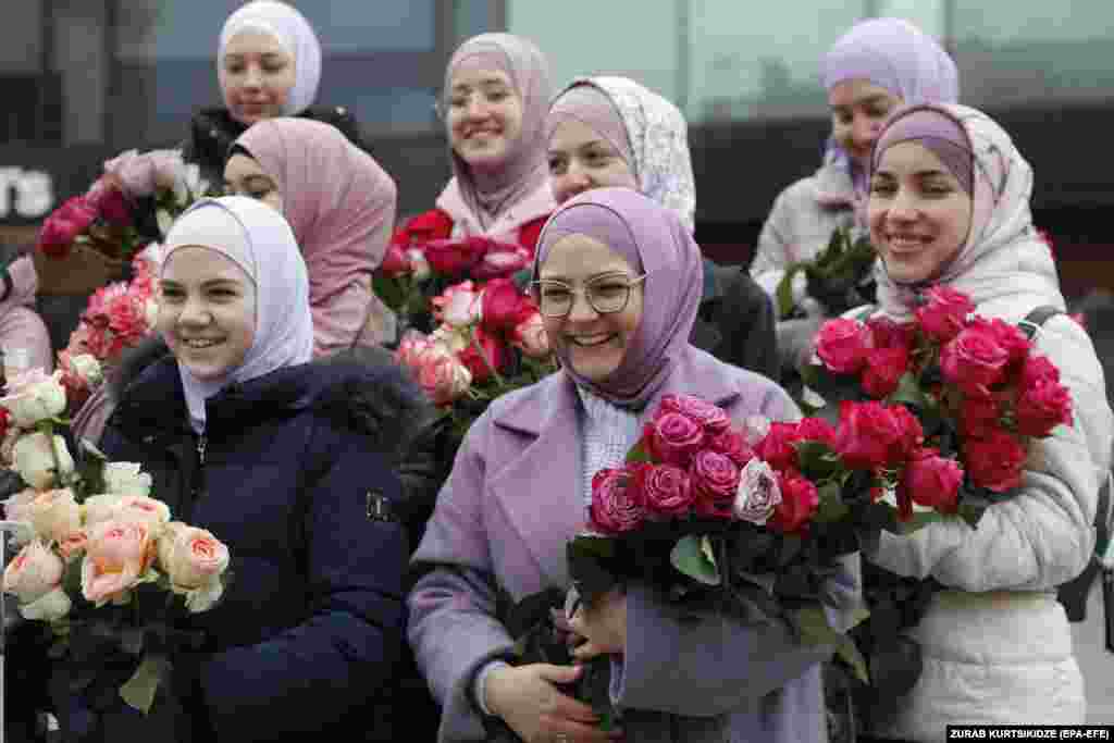 Ukrainian Muslim women pose during an event marking World Hijab Day in Kyiv.
