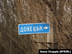 A street sign in Mariupol indicates the direction to Donetsk.