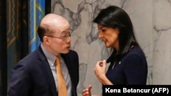 U.S. Ambassador to the United Nations Nikki Haley (right) confers with Chinese Ambassador to the UN Liu Jieyi earlier this week. 