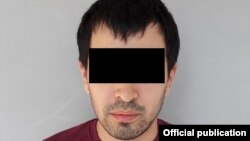 Кармалган киши. УКМК берген сүрөт.