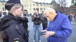 Masked Anti-Putin Protester Detained Again In Red Square