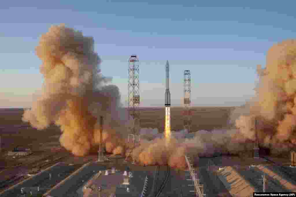 In a photo provided by Roskosmos, a Proton-M booster rocket carrying the Nauka module blasts off from the launch pad at Russia&#39;s space facility in Baikonur, Kazakhstan, on July 21. Nauka is a long-delayed lab module for the International Space Station. It&#39;s intended to provide more room for scientific experiments and space for the crew.