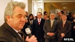Anatol Plugaru (left, at a book launch in this file photo) is a former director of Moldova's intelligence service and an ex-parliament deputy.