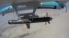 IRAN -- A handout picture provided by the Iranian Army's official website on September 11, 2020, shows an Iranian Simorgh drone carrying a weapon during the second day of a military exercise in the Gulf, near the strategic strait of Hormuz in southern Ir