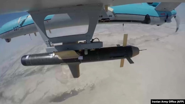 A handout picture provided by the Iranian Army's official website shows an Iranian Simorgh drone carrying a weapon during a military exercise in September 2020.