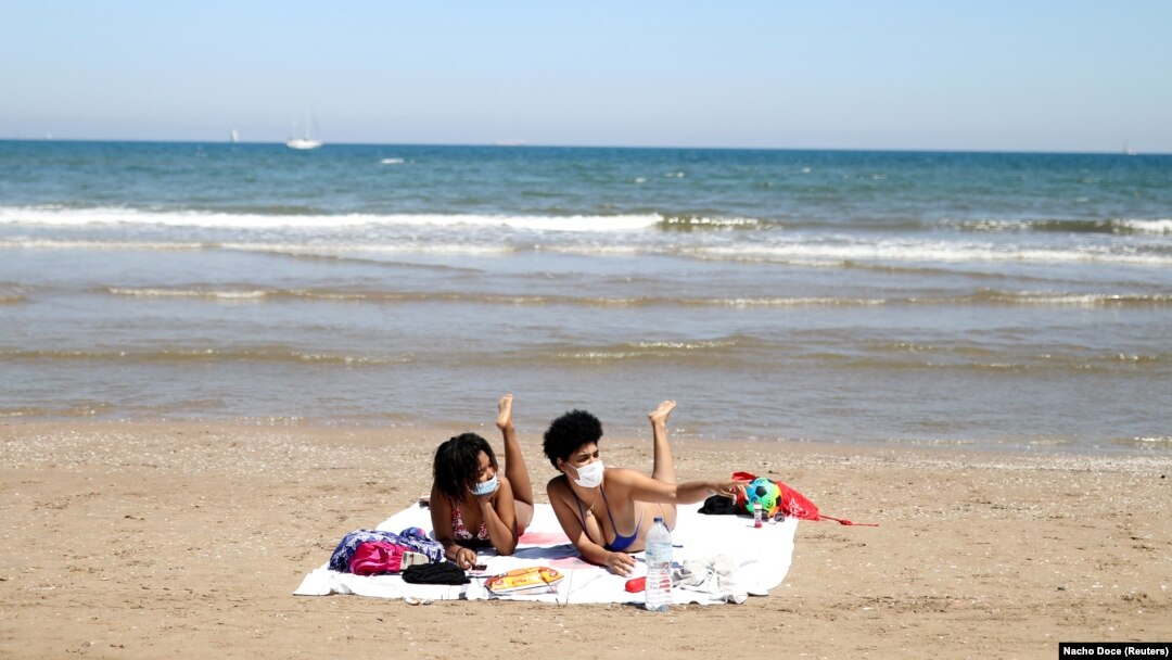 Maske na Malvarosa plaži u Valenciji