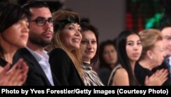 ONLY FOR USE BY UZBEK Service!!!TASHKENT, UZBEKISTAN - OCTOBER 12: H.E.Dr Gulnara Karimova (3rd L) chairwomen of the Board of trustees,Fund forum attends to the Balmain Fashion Show at Youth Creativity Palace on October 12, 2010 in Tashkent, Uzbekistan.