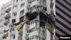 Наслідки влучання дрона по багатоповерхівці в Києві, 21 жовтня 2026 року