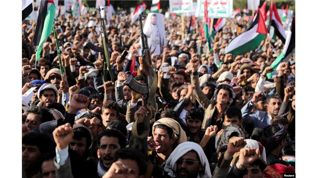 Huthi supporters rally in Sanaa on January 12.