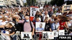 Protesters in Sarajevo mark the fifth anniversary of the murder of Dzenan Memic on September 11, 2021.