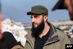 Abu Mohamed al-Jolani.