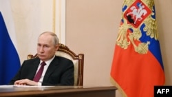 Ruski predsjednik Vladimir Putin predsjedava sastankom sa članovima vlade putem video konferencije u Kremlju u Moskvi 19. jula 2023. 